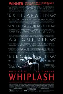 A spotlight shines on a male drummer. The title, "Whiplash", is shown at the bottom of the screen, with words praising the film listed in the background.